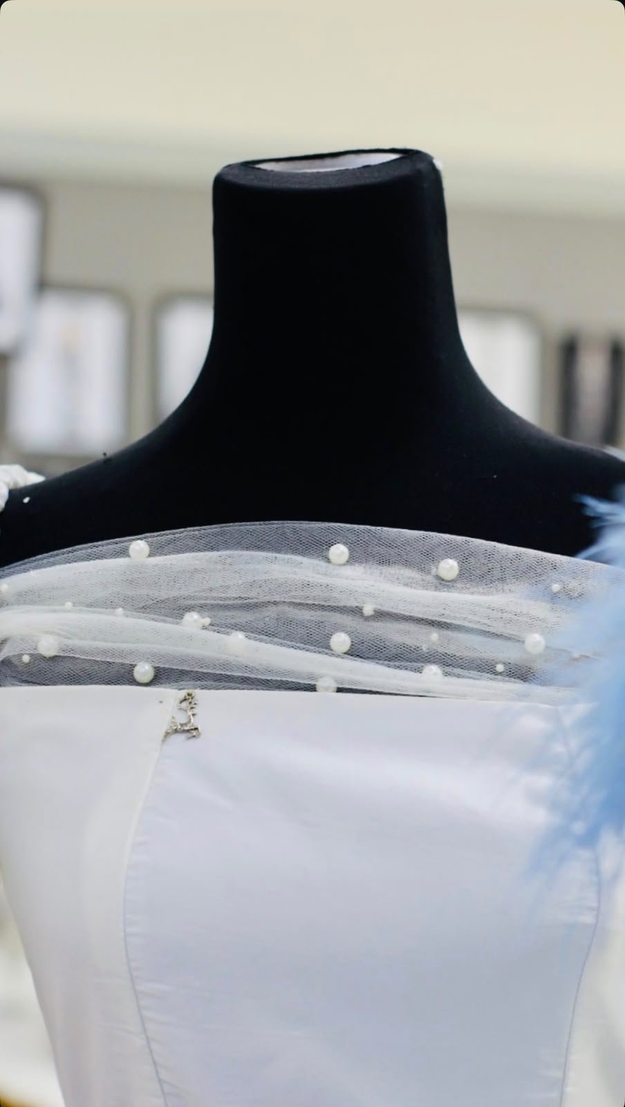 Pearl tulle detail on a white gown